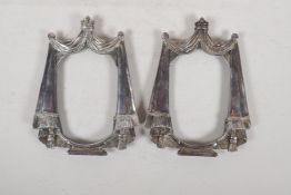 A pair of English silver plated photo frames in the form of curtains surmounted by a crown, 3½" x