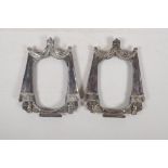 A pair of English silver plated photo frames in the form of curtains surmounted by a crown, 3½" x