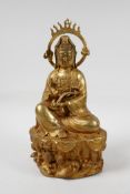 A Chinese filled gilt bronze Quan Yin seated on a lotus throne, 12" high, A/F repair