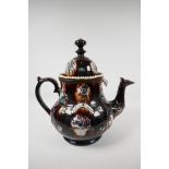 A very large C19th Barge ware tea pot, bearing the names William and Mary, dated 1875, 14" high