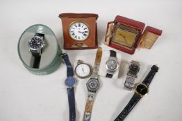 Two vintage travel clocks, a pocket watch and six wrist watches including Seiko, Citizen and Swatch