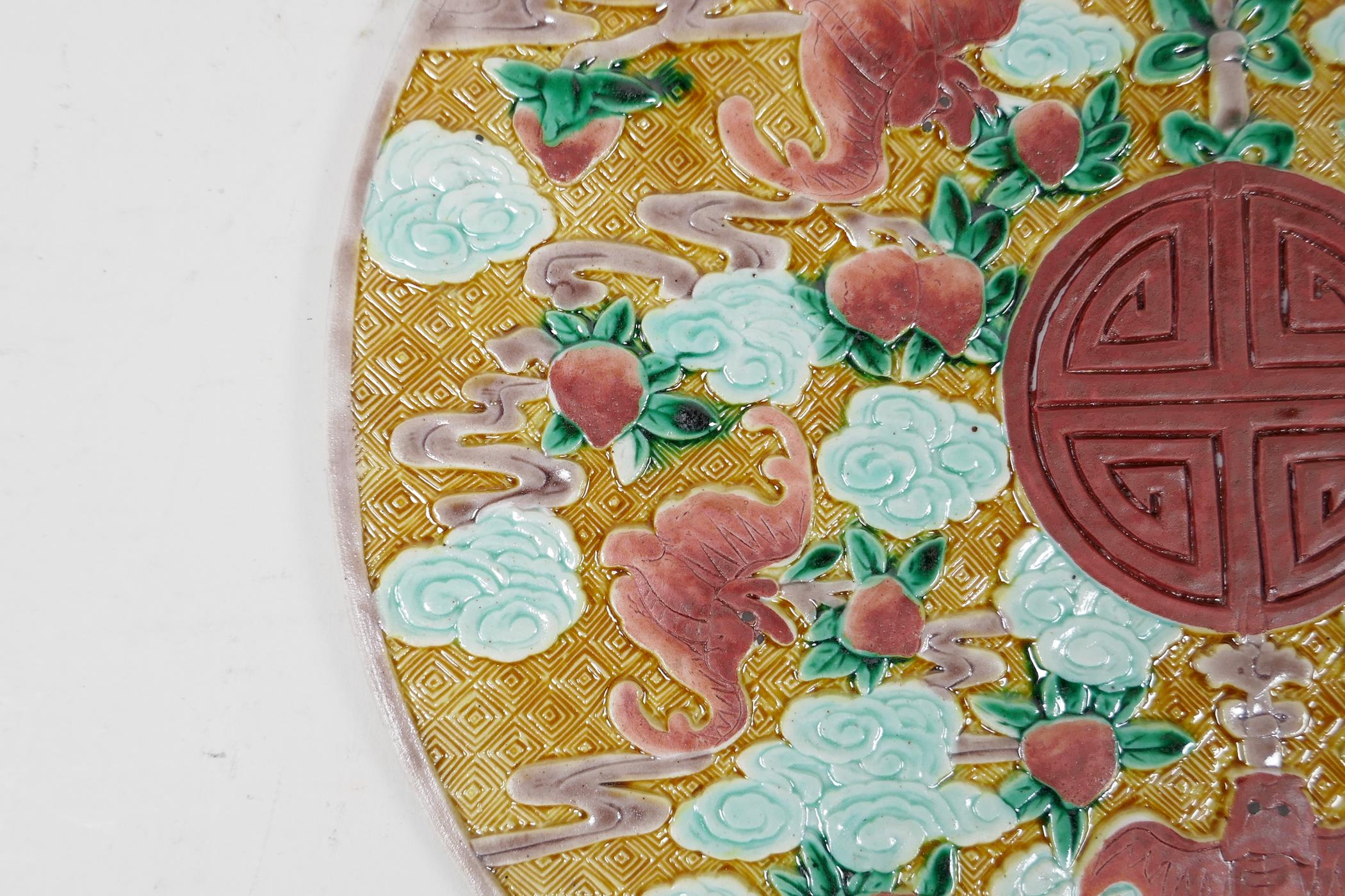 A Chinese Sancai glazed porcelain panel with raised peach, bat and auspicious symbol decoration, 8½" - Image 3 of 5