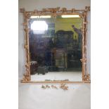 A C19th giltwood and composition overmantel mirror of naturalistic form, A/F, 52" x 59"