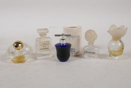 Five vintage miniature glass eau de parfum bottles, including Chanel No 5, YSL Baby Doll, Chloe etc,