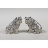 A pair of silver plated condiments in the form of bulldogs, marked 800 to base, 2½" high