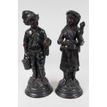 A pair of French C19th brown glazed earthenware figures, marked HB (Quimper) G75, 13" high