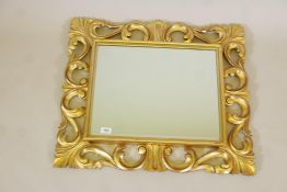 A Florentine style gilt wood wall mirror, 29" x 25"