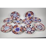 Ten C19th Imari plates painted in various patterns, 8" diameter