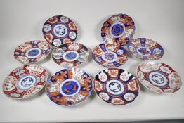 Ten C19th Imari plates painted in various patterns, 8" diameter