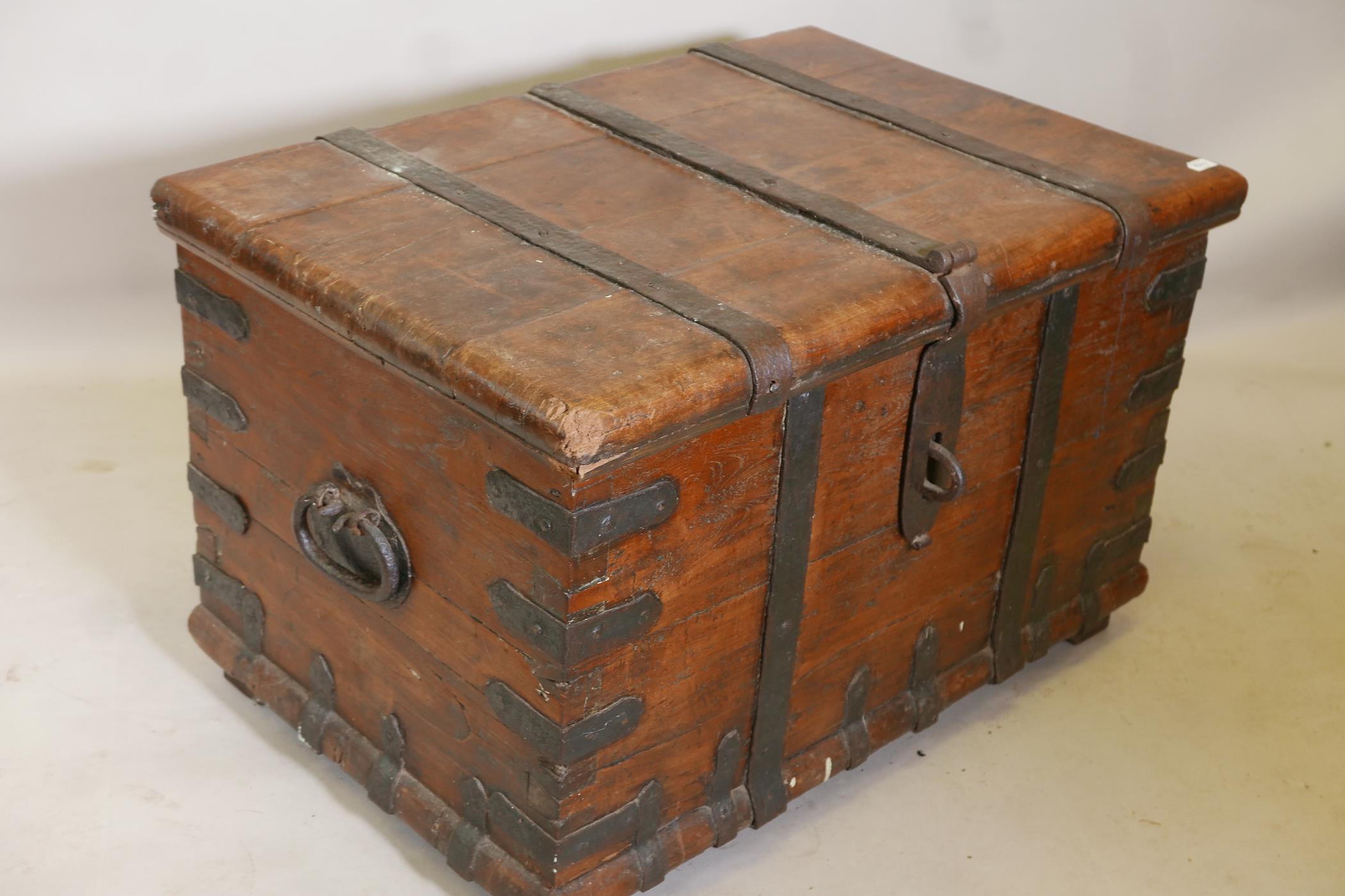 An antique hardwood silver chest with forged iron straps and carrying handles, 39" x 26" x 24" - Image 3 of 4