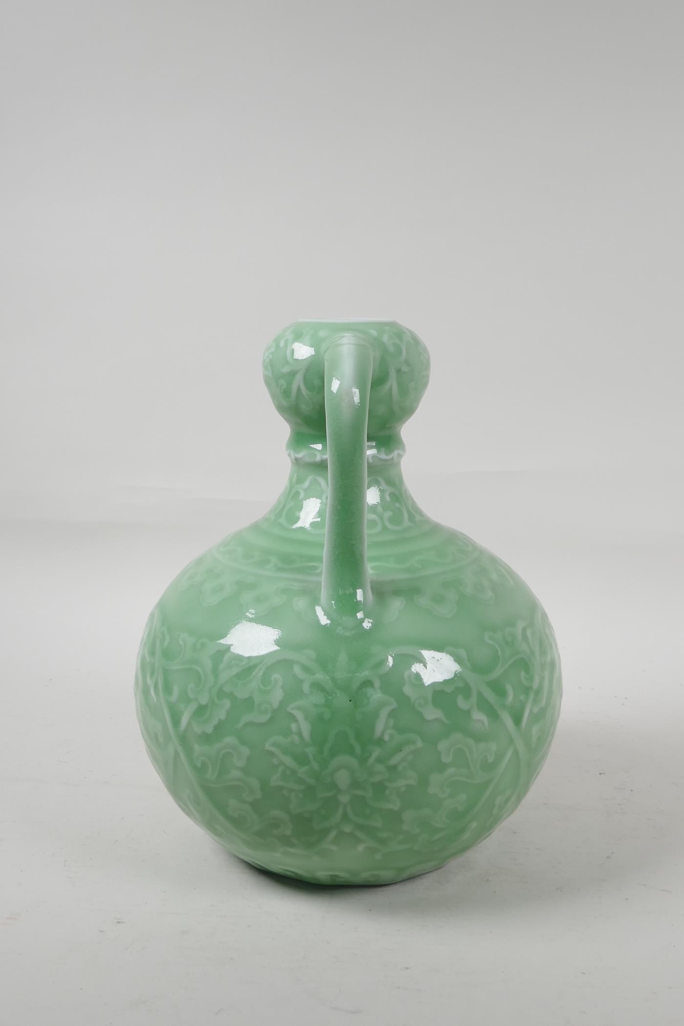 A Chinese green glazed porcelain garlic head vase, with underglaze lotus flower decoration, seal - Image 2 of 5