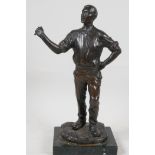 A bronze figure of a workman, signed G. Brandt, 11" high