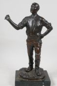 A bronze figure of a workman, signed G. Brandt, 11" high