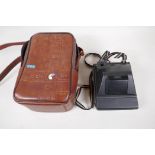 A Kodak Colourburst instant camera in original leather case
