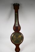 A C19th mahogany cased barometer/thermometer with broken pediment and shell inlay, 38" long (tubes