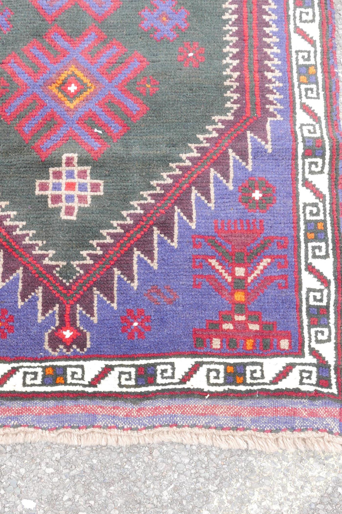 A multi colour ground full pile Belouch nomadic rug with unique medallion design, 36" x 60" - Image 3 of 4