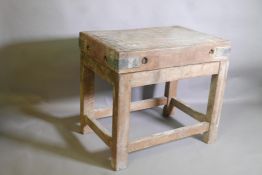 An antique butcher's block on stand, 36" x 24" x 5", stand 27" high