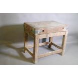 An antique butcher's block on stand, 36" x 24" x 5", stand 27" high