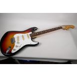 A vintage Japanese built Columbus Stratocaster guitar circa 1970 with soft case, 40" long