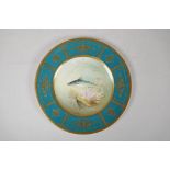 A Minton porcelain cabinet plate with painted mackerel, by Arthur Holland, with gilt embellished