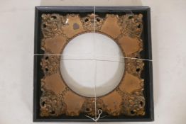 An antique giltwood and composition frame, housed in an ebony picture box frame, rebate 10" diameter