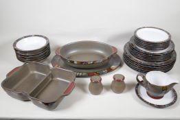 A Denby 'Marrakesh' six setting dinner service, with a pair of condiments, gravy jug, vegetable