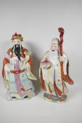 A Chinese porcelain figure of a dignitary with a bejewelled ruyi, painted in bright enamels, 15"