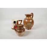 A Doulton Lambeth stoneware jug bearing the legend 'He that buys good ale' embossed with various