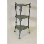 A painted cast iron three tier pot stand, 27" high