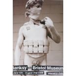 After Banksy, Banksy versus the Bristol Museum, June to August 2009, exhibition poster depicting '