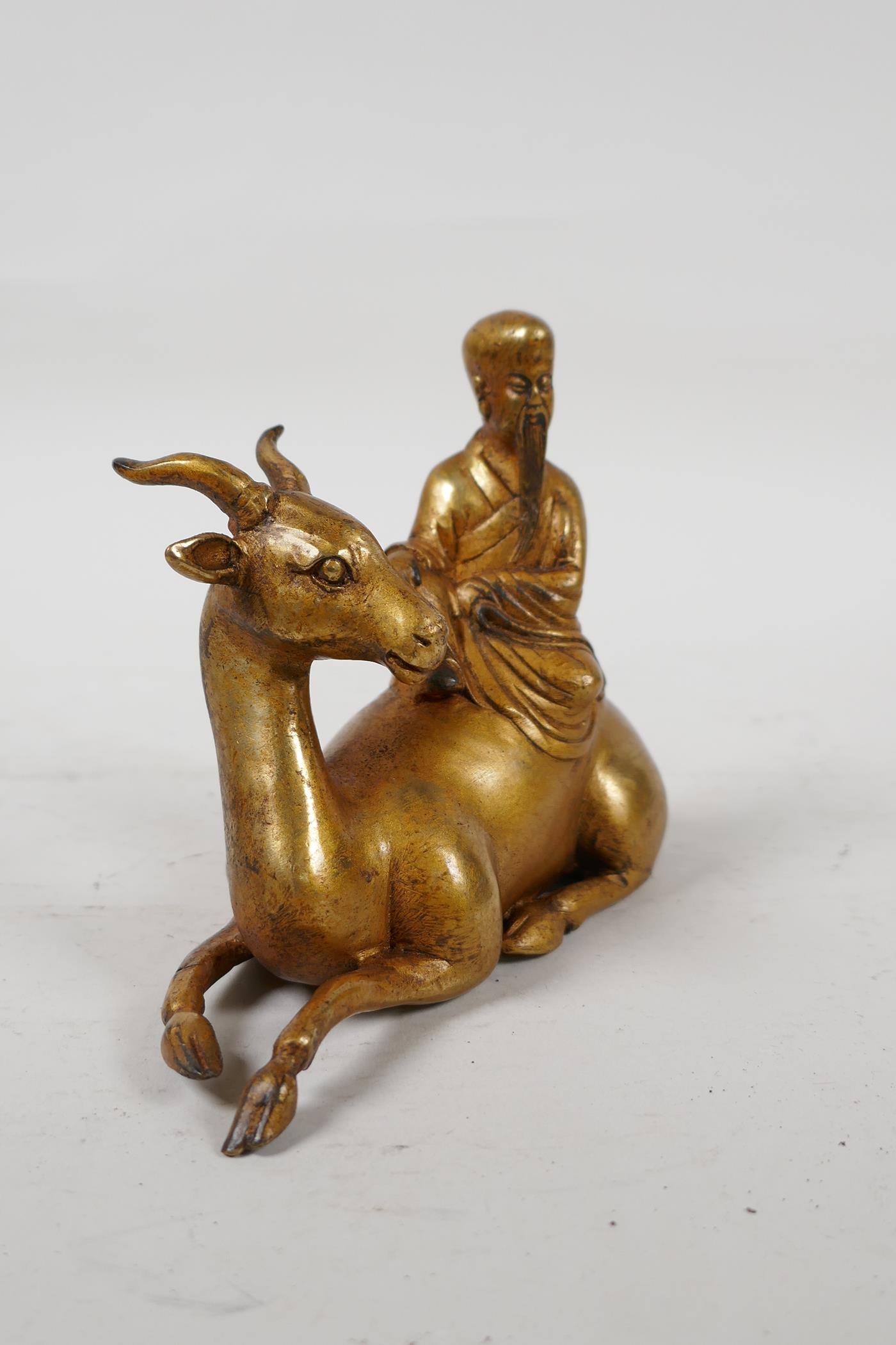 A Chinese gilt bronze of Shao Lao riding a deer, 5" long, 4" high - Image 3 of 5