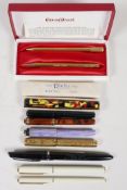 Four Conway Stewart 'Dinkie' fountain pens (one case A/F), a Conway Stewart Princess pen and