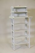 A painted pine seven tier open shelf, 20½" x 9", 40" high