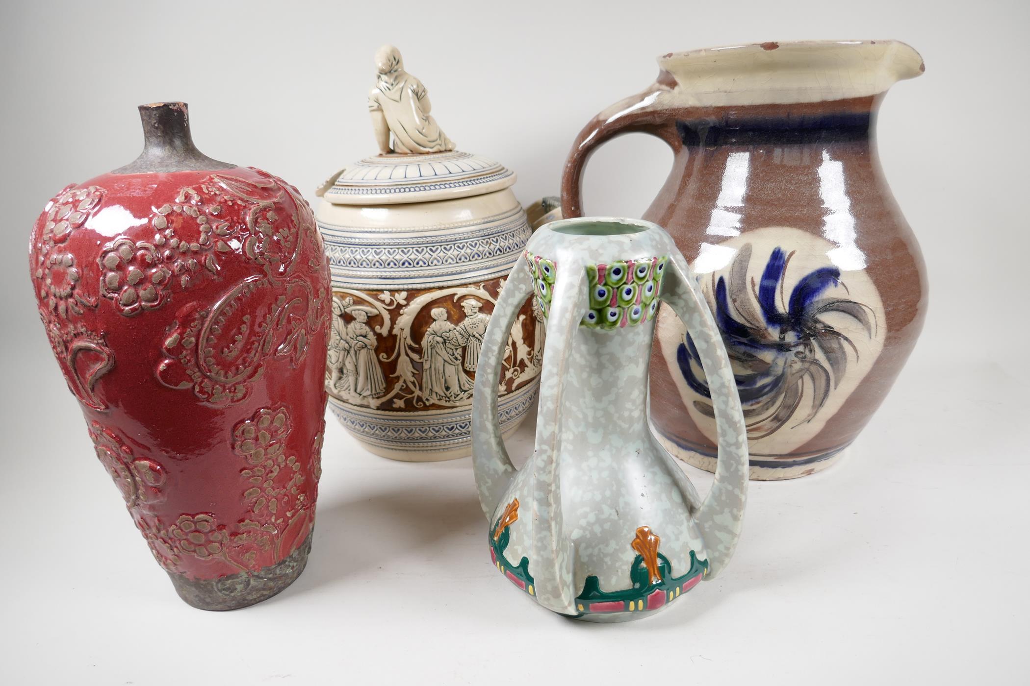 A Wattisfield ware pottery jug, 13" high, a German stoneware jar and cover, and two continental