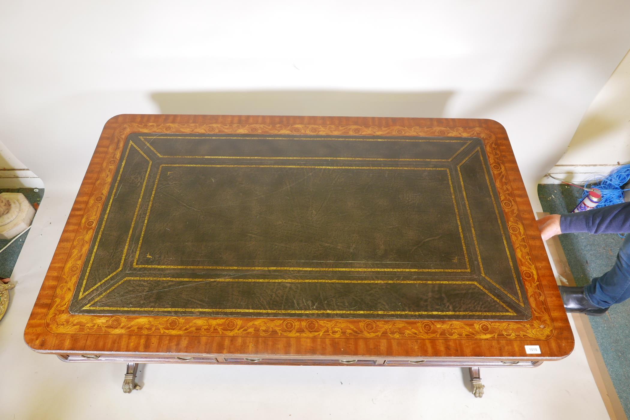 A Regency style mahogany six drawer partner's library table, with leather inset top, bears label - Image 3 of 7