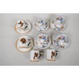 Four Royal Doulton coffee cans embossed and painted with fox heads, and two saucers, together with