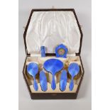 A Walker & Hall of Sheffield hallmarked silver and blue enamel dressing table vanity set and desk