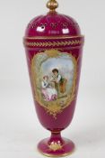 A porcelain vase and cover decorated with a courting couple and landscape verso, with gilt borders