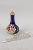 A C19th Crown Derby perfume bottle painted with flowers on a royal blue ground, 4" high, together
