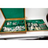 A good military style oak canteen case containing a quantity of various silver plated cutlery part