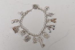A 925 silver charm bracelet, 7" long, 27g gross