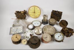 A quantity of clock movements and spare parts