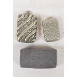 Two silver plated vesta cases, 2" long, and an antique pewter snuff with delicate engraved floral