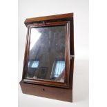 A C19th mahogany vanity box with mirror and fitted trays, 8" x 11" x 3"