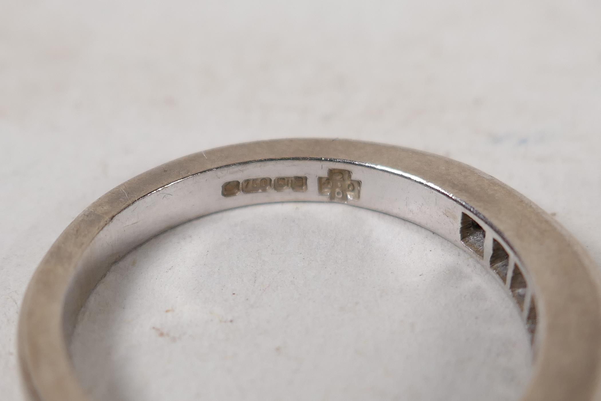 A hallmarked 18ct white gold half eternity ring, set with eleven princess cut diamonds, .5ct - Image 3 of 5