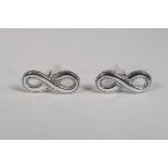 A pair of 925 silver cufflinks in the form of the infinity symbol