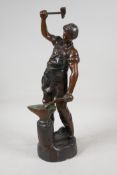 A. Inrofilac, bronze figure of a blacksmith at work, signed, 15½" high