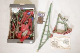 A quantity of vintage Meccano including clockwork motors