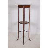 An Edwardian inlaid mahogany two tier jardiniere stand, raised on splay supports, 12" x 12" x 48"