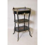 A French C19th ebonised three tier etagere with ormolu mounts, three quarter gallery, single